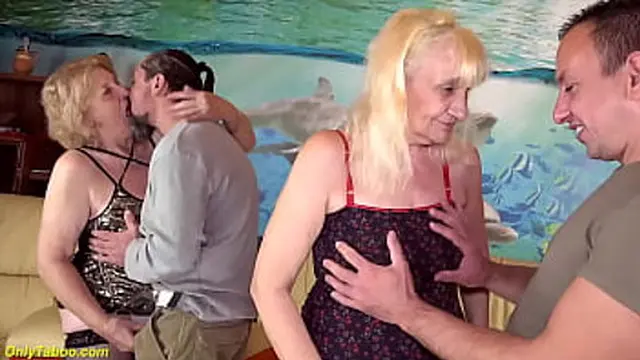 two elderly milfs get pounded hard by their big dick🍆 boyfriends in a wild group sex session