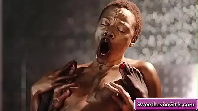 Watch this lesbo milf getting seduced by her black friend for a good fuck an cover themselves in wet mud